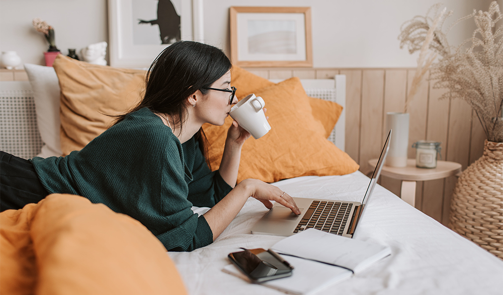 woman working on bed